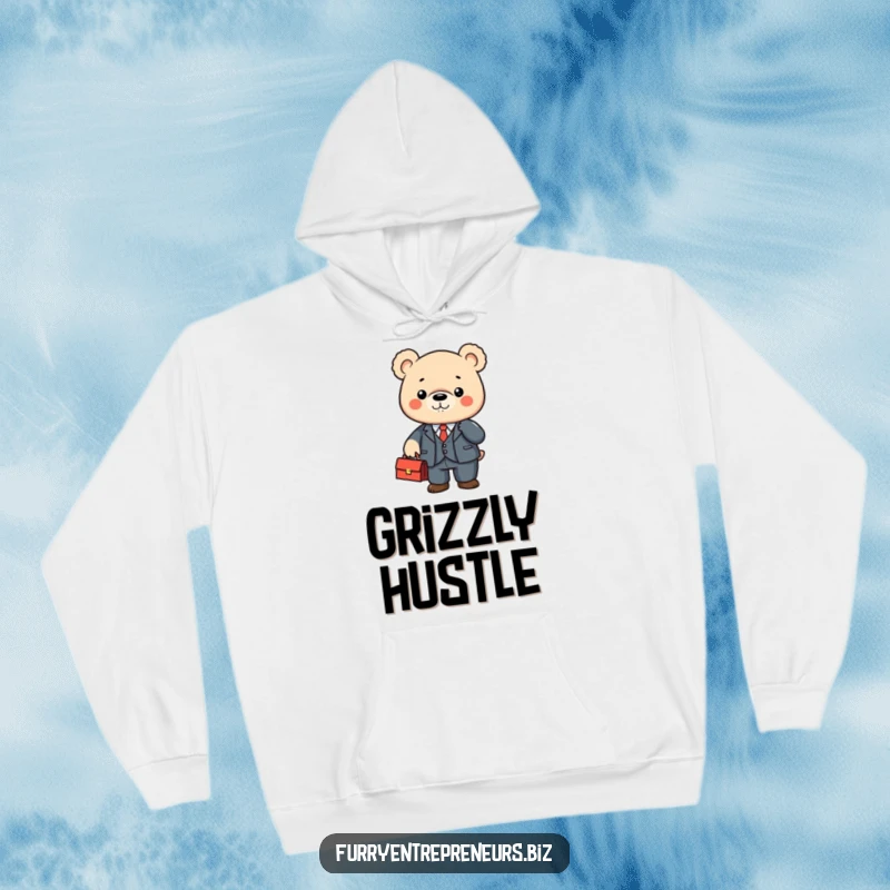 Cute bear character in a tiny suit shaking a briefcase on a cozy hoodie, perfect for warmth and laughs.