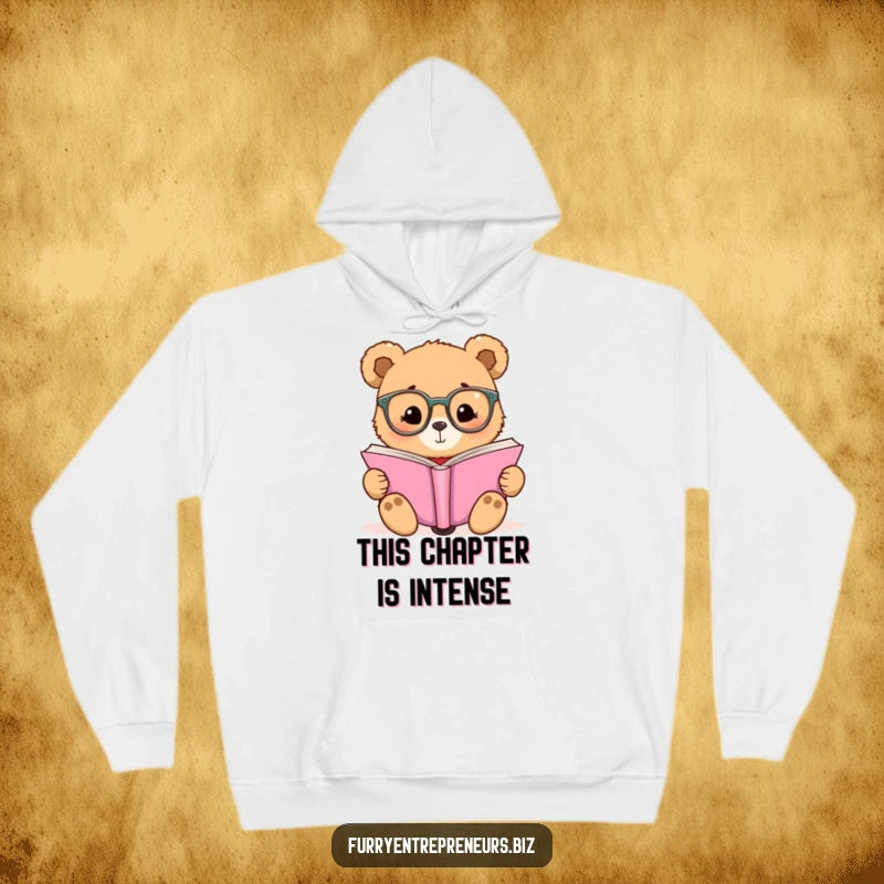 Funny hoodie showcasing a bear with tiny glasses intently reading a large book, perfect for book lovers.