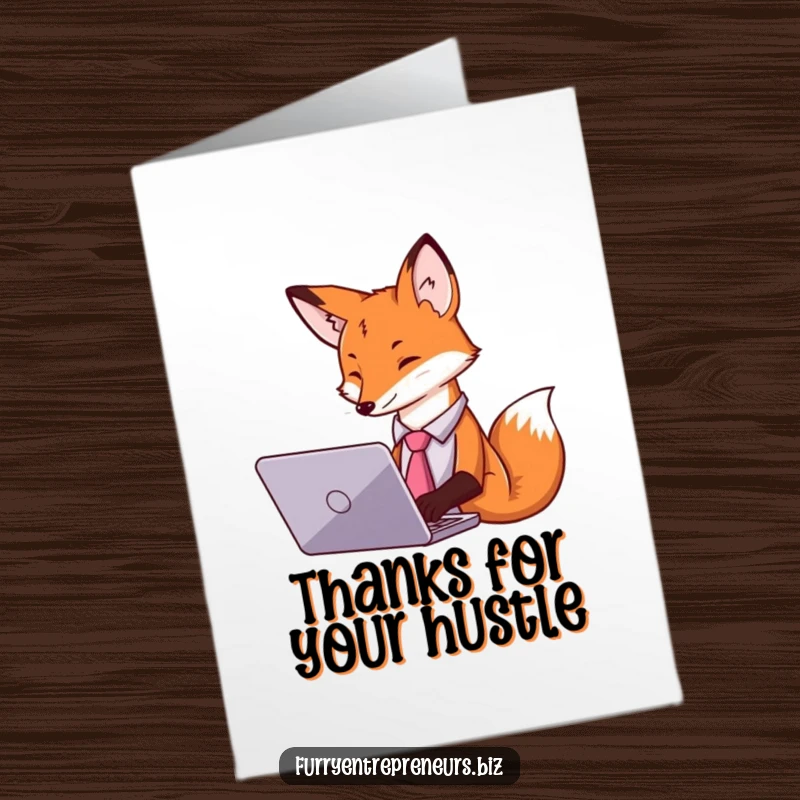 Funny free printable thank you card: A fox in a tie working on a laptop, expressing thanks with professional charm.