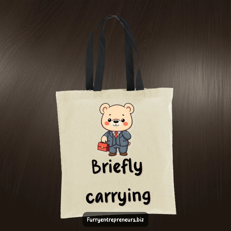 Cute bear character in a tiny suit shaking a briefcase on a tote bag, ready for any task.