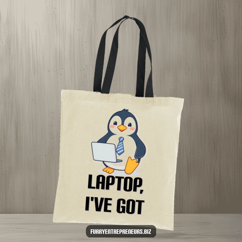 Funny penguin tote bag with a penguin wearing a tie and holding a laptop, ideal for carrying work essentials with a professional touch.