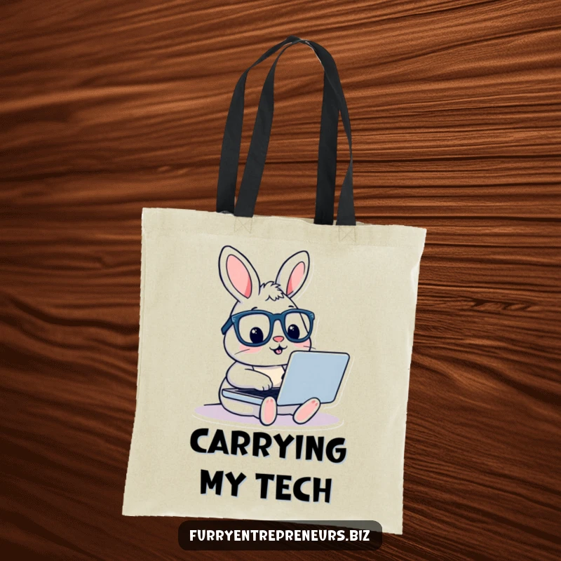 Playful rabbit with glasses typing on a laptop on a durable tote bag, conveying a love for technology and writing humorously.